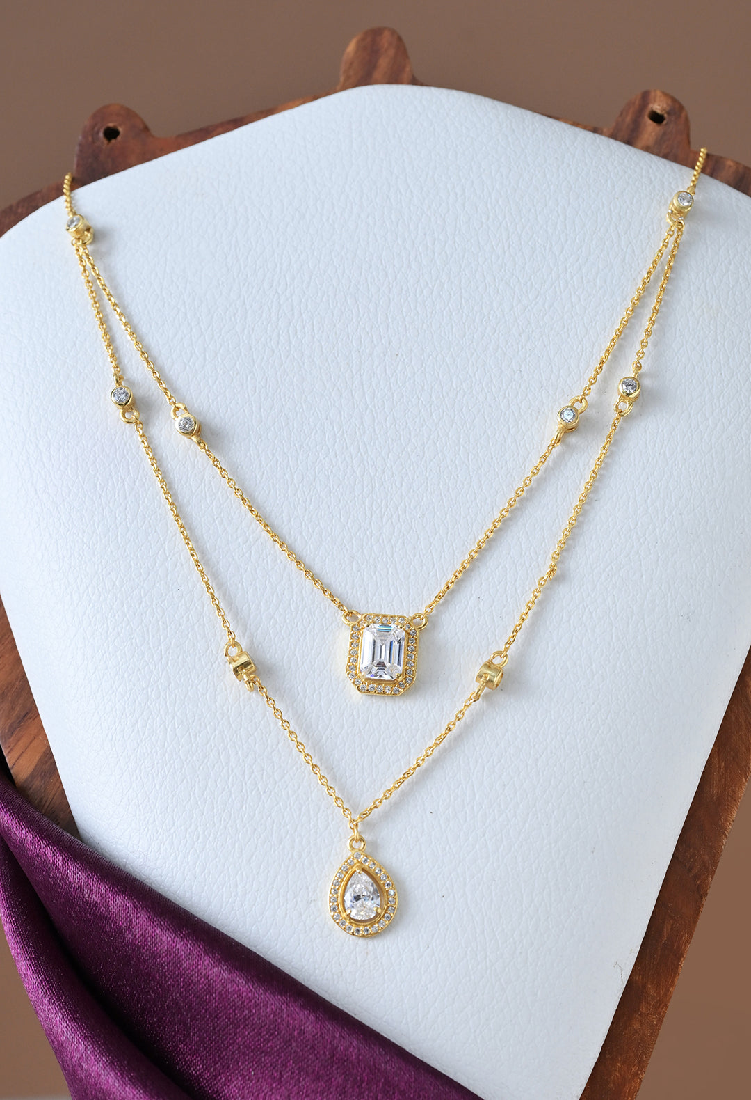 Chain necklace with teardrop and rectangle solitaire